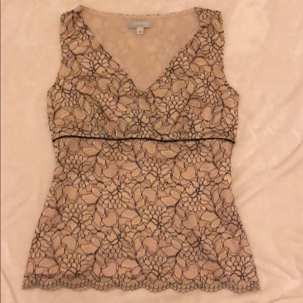 Cream and black lace top. Size M. Hidden zipper.